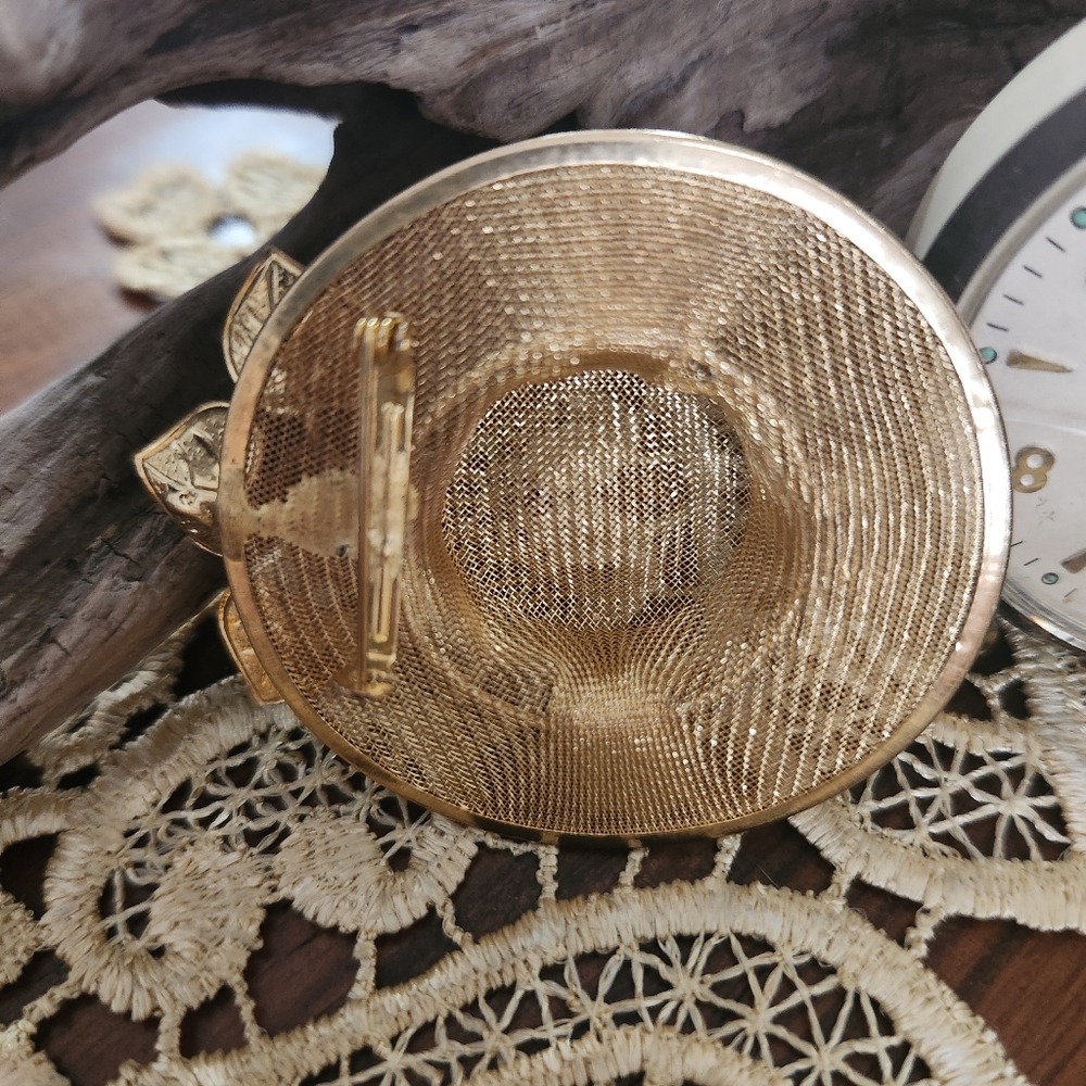 Elegant Gold Decorative Hat with Floral Accents - Picture 2 of 2